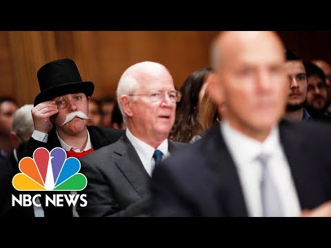 &#039;Monopoly Man&#039; Photobombs Former Equifax CEO Richard Smith&#039;s Congressional Hearing | NBC News