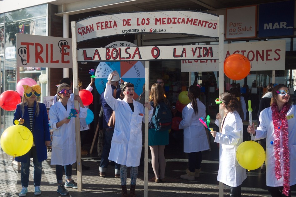 Barcelona Center for Artistic Activism School for Creative Activism - carnival action to lower drug prices in front of a hospital