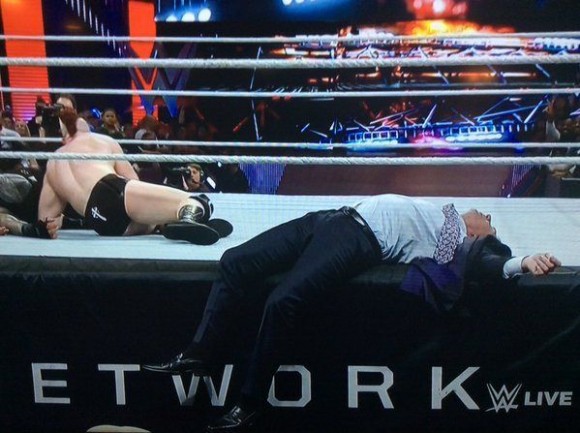Vince McMahon lies knocked out