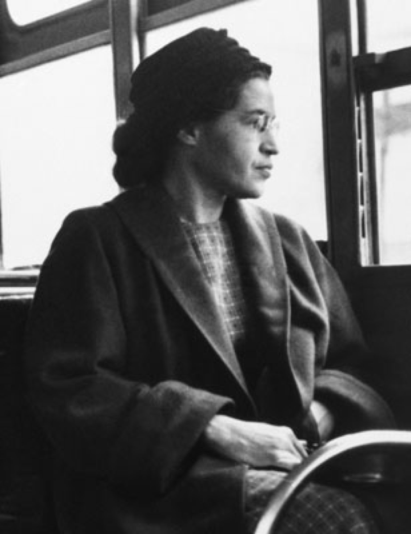 tight shot of Rosa Parks, sitting, alone on the bus