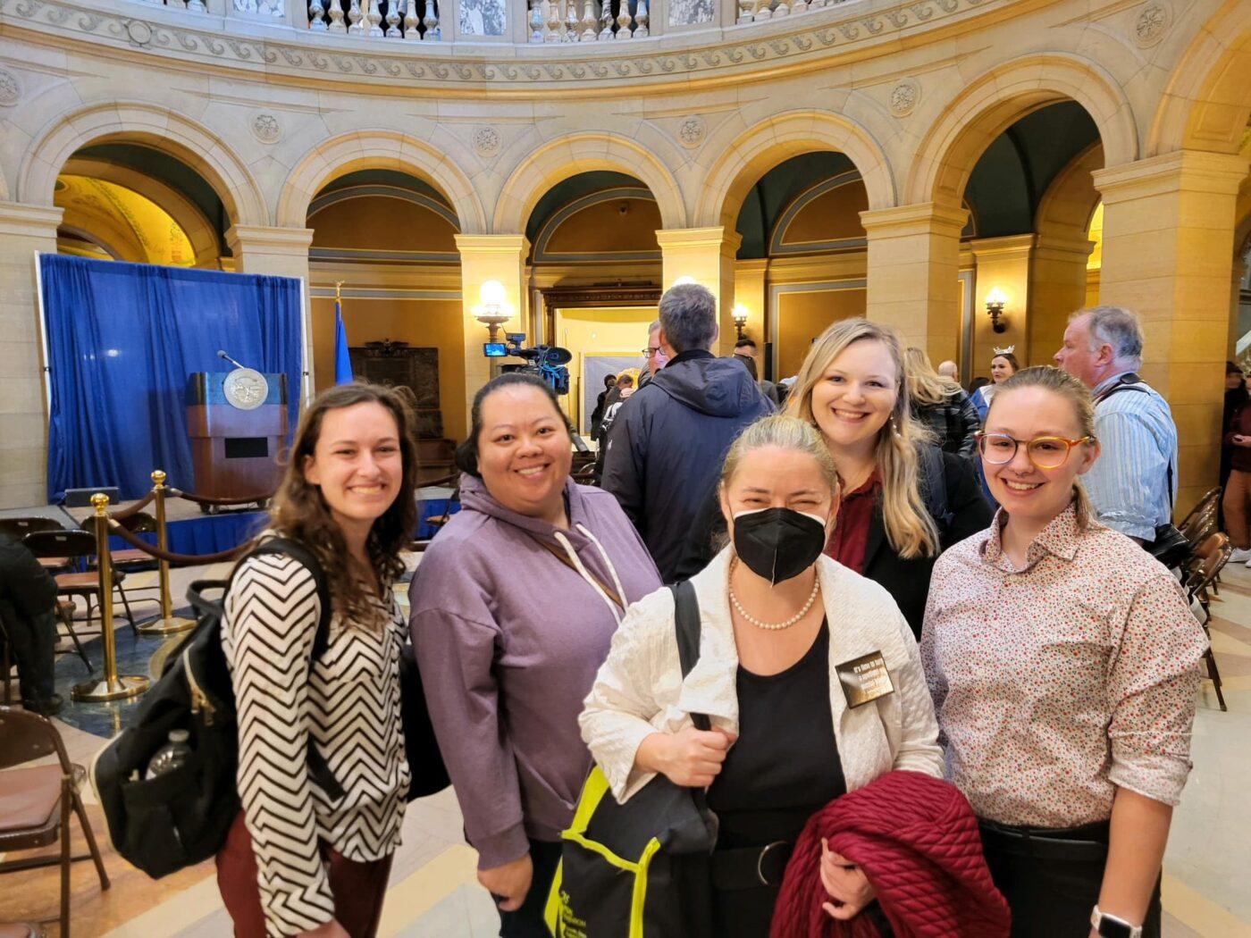 Margit and their students at the Minnesota State Capitol for Mental Health Day on the Hill