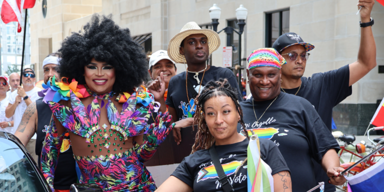 PHOTO fun photo of artistic activism at pride with a drag queen