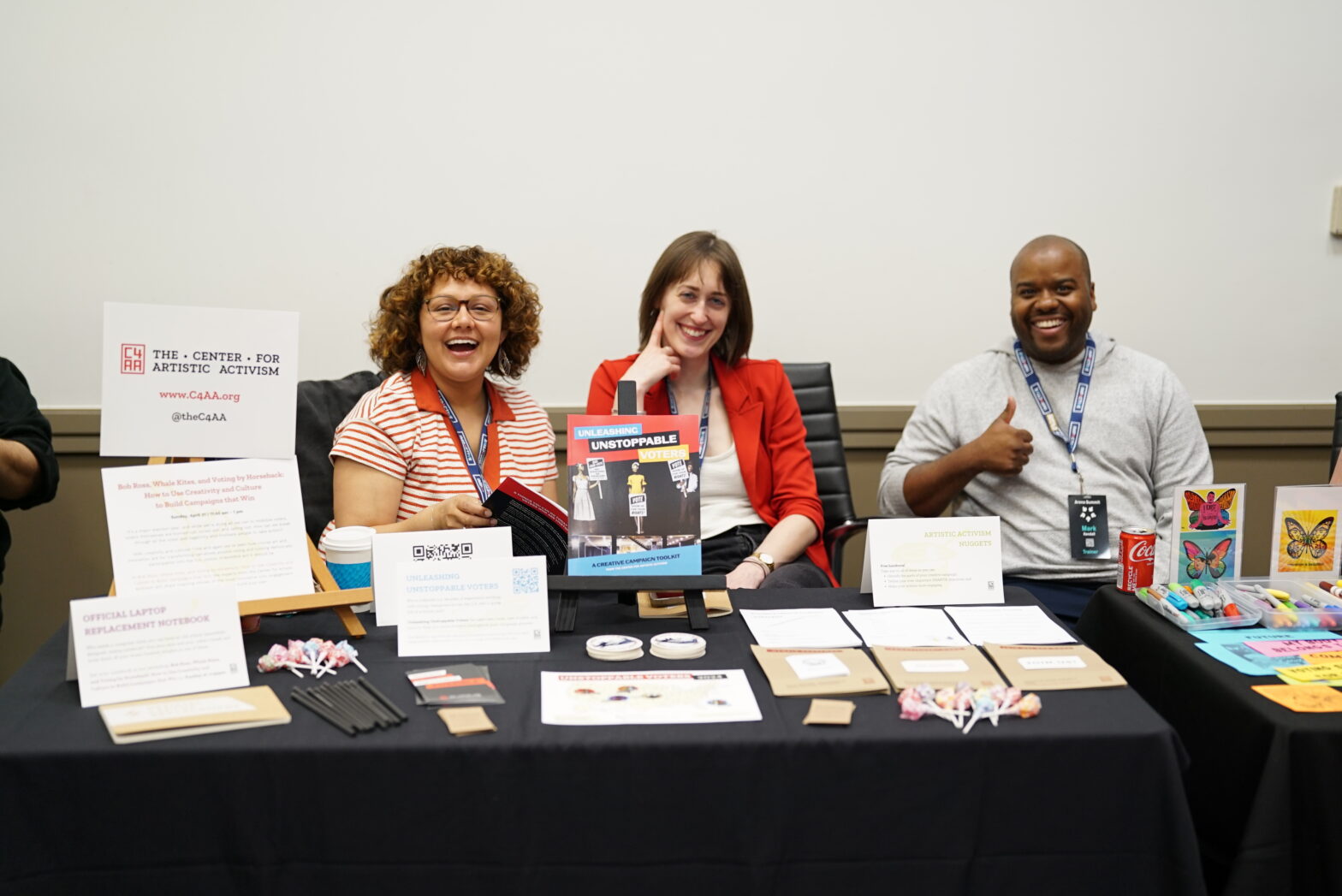 PHOTO C4AA team members tabling at Arena Summit in 2004