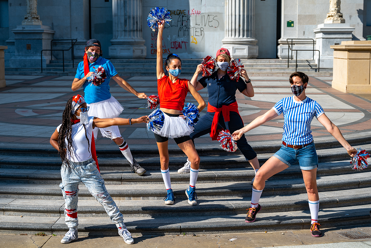 PHOTO unstoppable voters cheerleaders in red, white, and blue on government building steps
