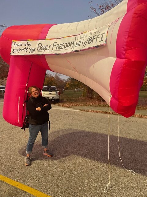 Jocelyn at polling places with the wearable inflatable megaphone encouraging people to vote their values